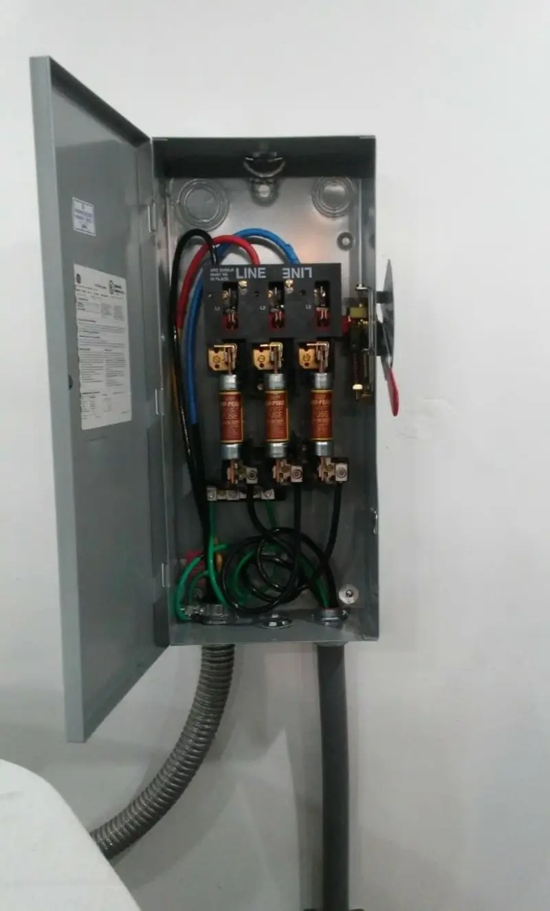 Three-phase disconnect switch installed for Smoke Detector Installation in Crawfordville